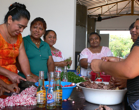 women preparing for the tacos